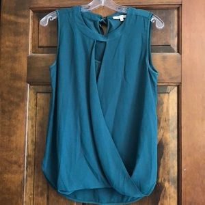 Green sleeveless blouse